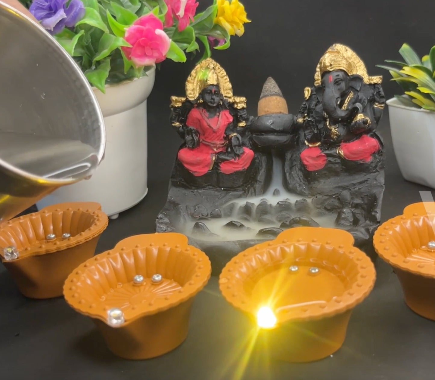 Ganesh ji & laxmi ji with 100 water cones FREE